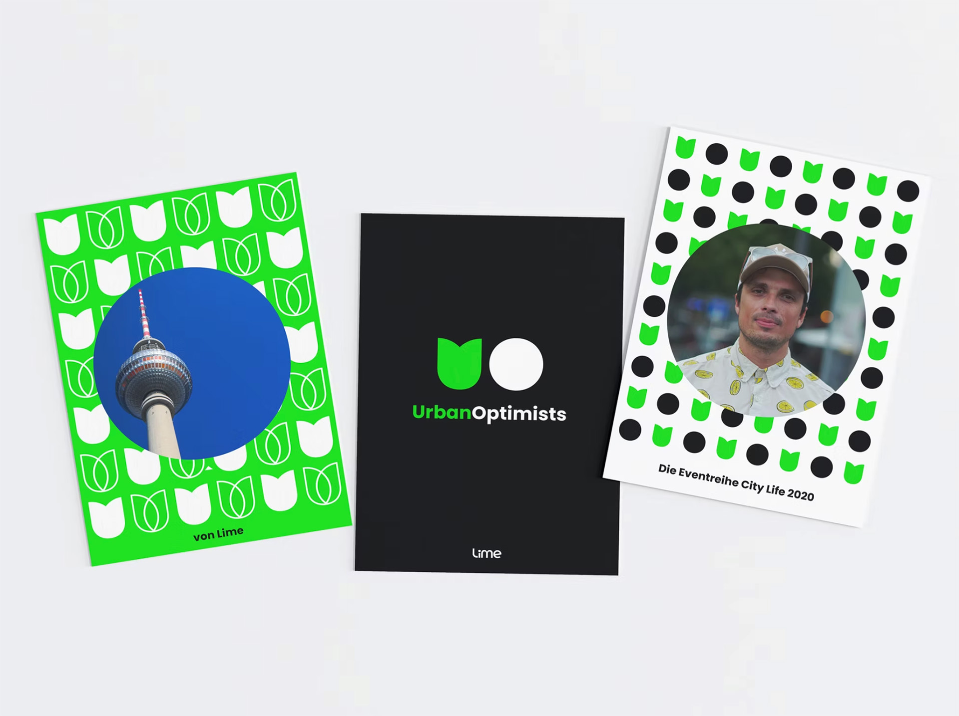 Three Urban Optimists postcards, including the Berlin TV tower and a portrait